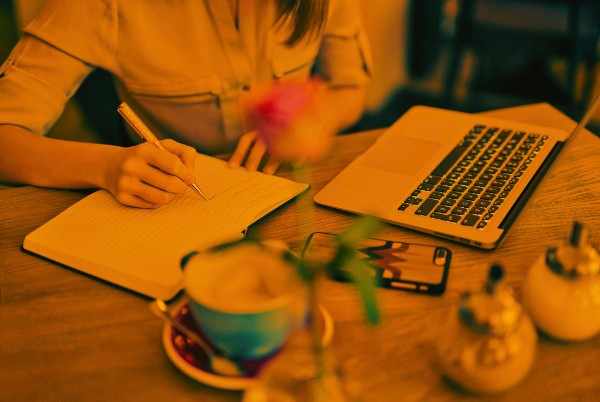 Researcher receiving professional manuscript writing services for academic journal publication