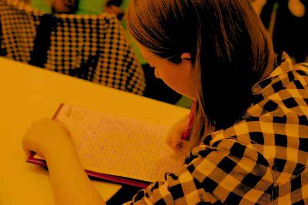 Student reviewing plagiarism report with Turnitin support for thesis