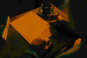 Postgraduate student receiving expert masters dissertation help from academic professional